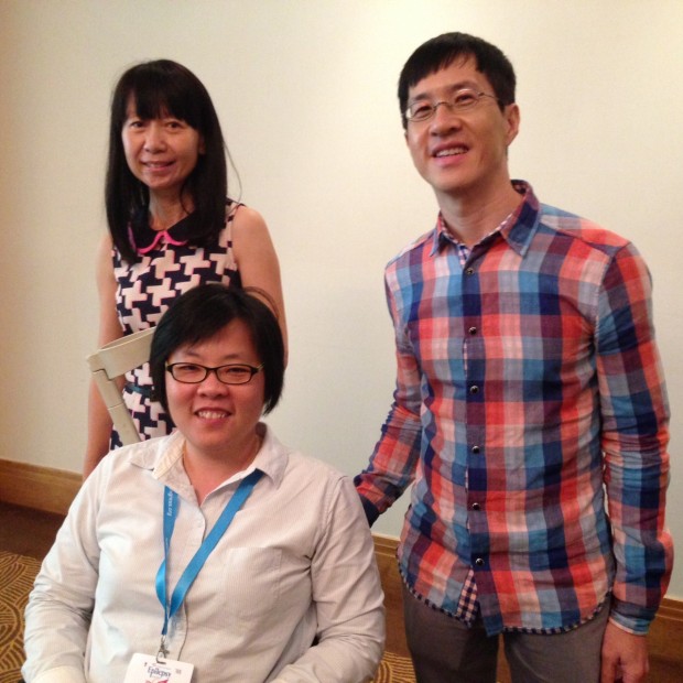 Ming Ying Goi, a member of Epilepsy Care Group Singapore who received an Outstanding Person Living with Epilepsy Award at the 10th Asian & Oceanian Epilepsy Congress pictured with Diane Koh and Sherman Goh.